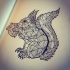 Exiting full-geometric squirrel keeping acorn tattoo design