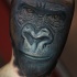 uscita dal realismo museruola di gorilla nera tatuaggio