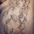 Fine new school mermaid with beads in hair tattoo design
