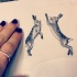 Funny dotwork-style jumping hares tattoo design