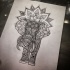 Geometric-ornamented elephant and mandala flower tattoo design