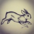 Good dotwork running rabbit tattoo design