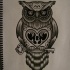 Gorgeous diamond-eyed owl keeping a key tattoo design