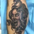 Gorgon medusa tattoo on leg