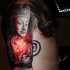 Great buddha tattoo on shoulder