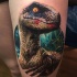 Great colorful dinosaur tattoo on thight