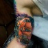 Great realistic ship in space tattoo on biceps