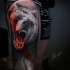 Great roaring bear tattoo on thight