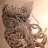 Grey horned octopus on sea weed bottom tattoo design