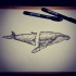 Grey separated whale tattoo design
