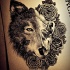 Half-wolf half-skull with roses tattoo design