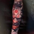 Hannya mask tattoo on arm