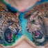 Tatuaje en el pecho, guepardo y león increíbles amenazantes
