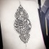 Indian-style ornate henna peacock tattoo design