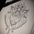 Kind-eyed lion head tattoo design