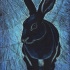 Lovely black waiting midnight hare tattoo design