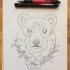 Lovely uncolored bear head with floral frame tattoo design