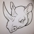 Mad uncolored rhino head tattoo design