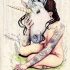 Naked tattooed girl with huge white unicorn mask tattoo design