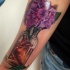 Nice flowers and heart in bottle tattoo
