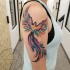 Nice watercolor fenix tattoo on shoulder