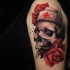 Nurse skull tattoo on shoulder