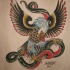 Old school eagle fighting with huge green snake tattoo design