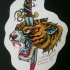 Old school tiger head killed with long dagger tattoo design