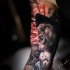 Original screamer portrait tattoo on arm