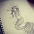Pencilwork sitting mermaid with flippers on head tattoo design