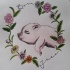 Pleased rosy pig in flowered frame tattoo design