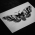 Posh old school black-and-white butterfly tattoo design