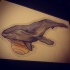 Purple swimming whale with yellow planet by side tattoo design