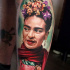 Realistic Frida Kahlo arm tattoo
