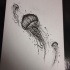 Realistic black-and-white jellyfish trio tattoo design