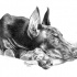 Realistic black-ink lying doberman tattoo design