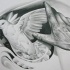 Realistic human hand and white flying dove tattoo design