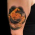 Realistic yellow rose tattoo with compas