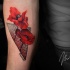 Red poppy flower tattoo