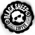 Sheep head in sunglasses with round white lettering tattoo design