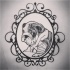 Shy black-and-white bulldog in curled frame tattoo design