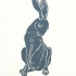 Shy blue-ink sitting hare tattoo design