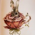 Shy hare hidding in rose-shaped cup tattoo design