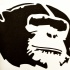 Simple black chimpanzee head tattoo design