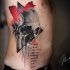 Skull ribs piece tattoo
