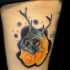 Skull with horns mask and rose tattoo