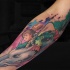 Spirited Away cartoon tattoo on forearm