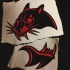 Splendid red-and-black panther head top and jaw tattoo design
