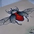 Splendid winged red heart-body bug in horned helmet tattoo design