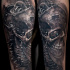 Super realistic biomechanical skull tattoo